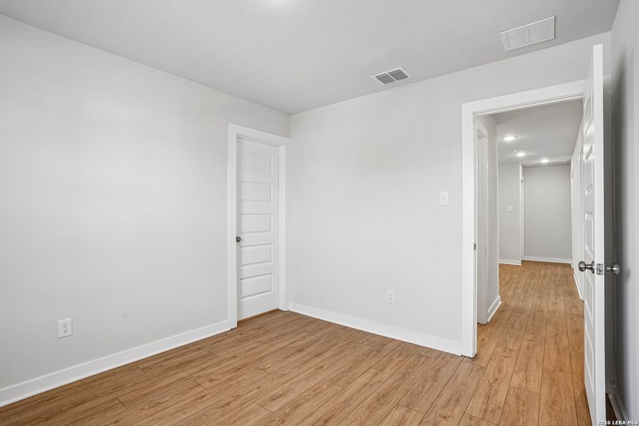Spacious, unfurnished interior of a new home in University Village, San Antonio (Image 29).