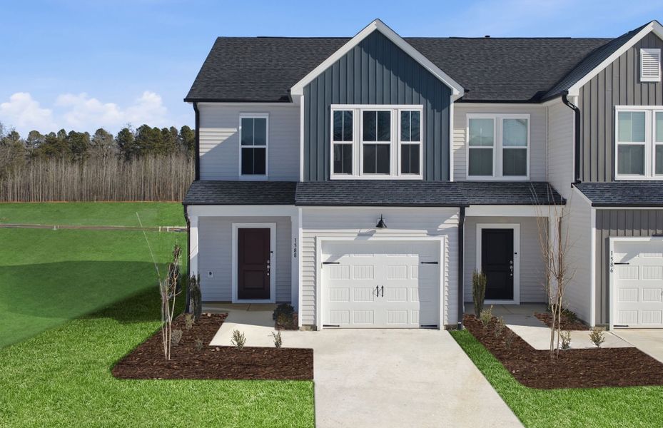 Front exterior of a new home in Poets Walk, Whitsett, NC, highlighting curb appeal (Image 28).