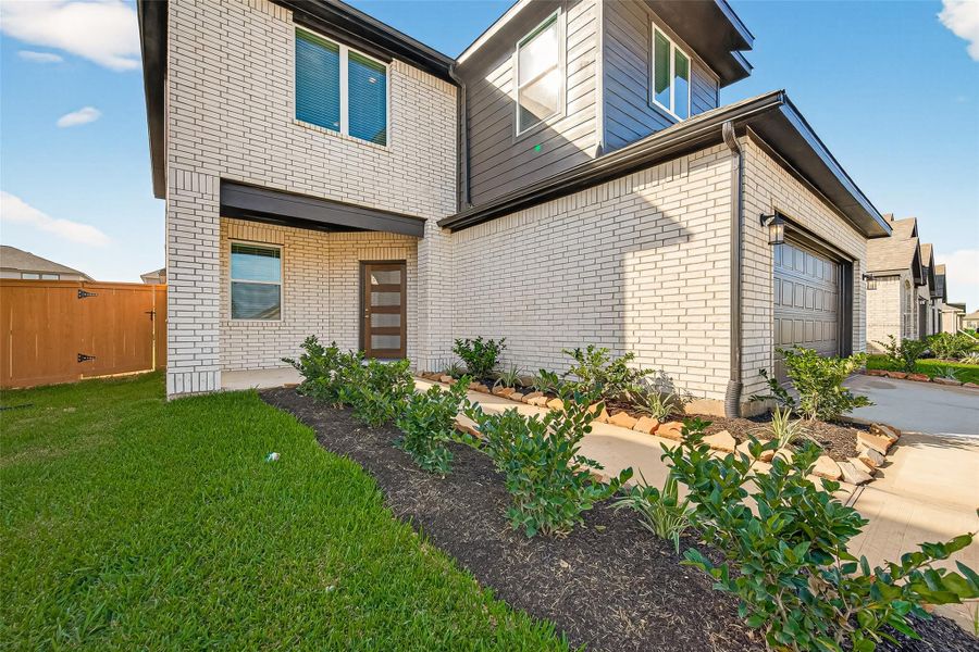 Exterior details and patio area of a home in Sunterra, Katy (Image 20). Exterior details and patio area of a home in Sunterra, Katy (Image 20).
