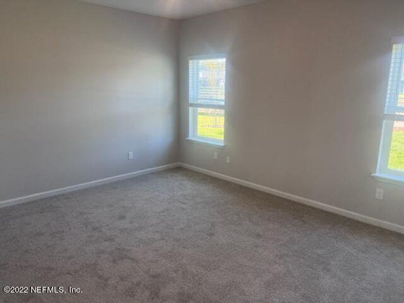 Spacious, unfurnished interior of a new home in TrailMark, St. Augustine (Image 12).