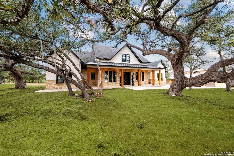 Exterior details and patio area of a home in , Bandera (Image 28).