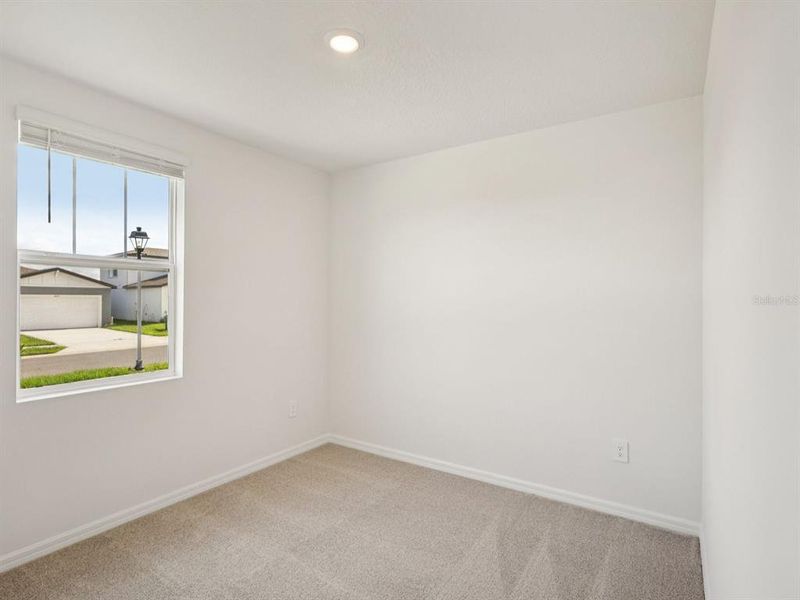 Spacious, unfurnished interior of a new home in The Reserve at Van Oaks, Auburndale (Image 24).
