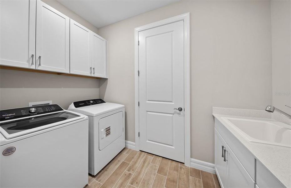 Furnished interior view inside a new home in Cedar Grove at The Woodlands, North Port (Image 6).