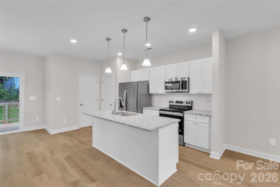 Furnished interior view inside a new home in , Statesville (Image 18).
