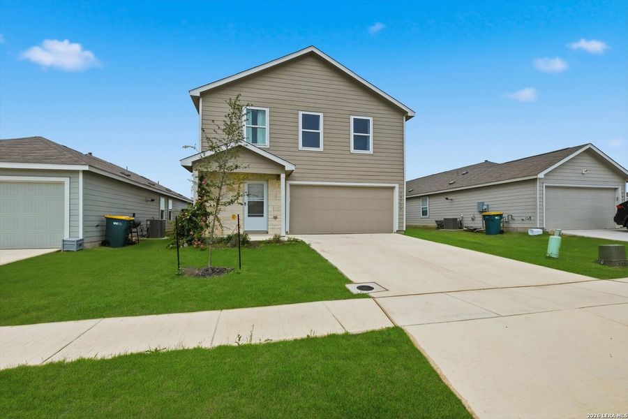 Front exterior of a new home in , Converse, TX, highlighting curb appeal (Image 2). Front exterior of a new home in , Converse, TX, highlighting curb appeal (Image 2).