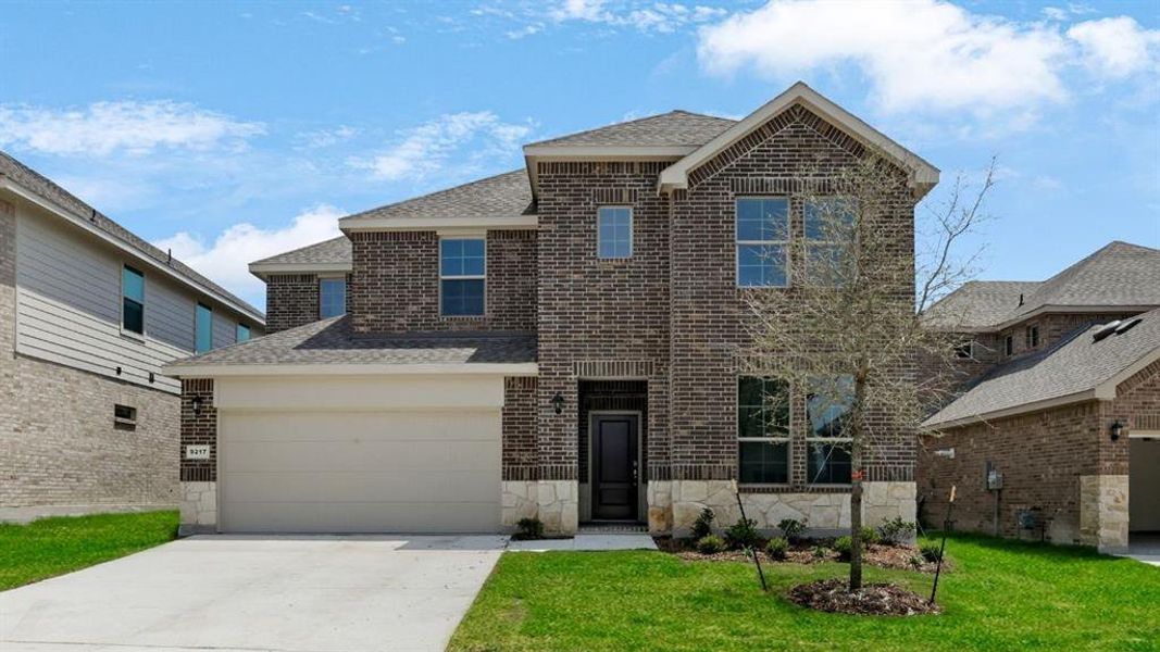 Front exterior of a new home in The Landing at Hidden Lakes, McKinney, TX, highlighting curb appeal (Image 1).
