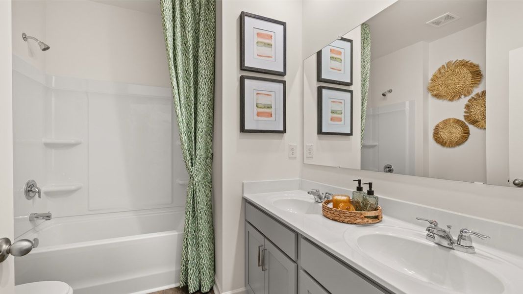 Representative furnished interior of a home built from the Denton by D.R. Horton in Jackson Landing, Jefferson (Image 30).