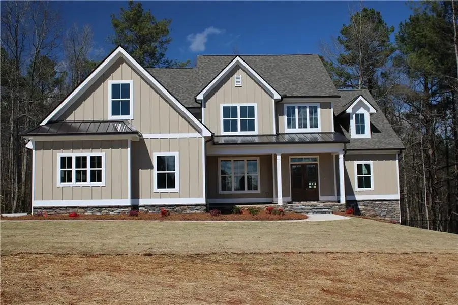 Front exterior of a new home in , Villa Rica, GA, highlighting curb appeal (Image 2). Front exterior of a new home in , Villa Rica, GA, highlighting curb appeal (Image 2).