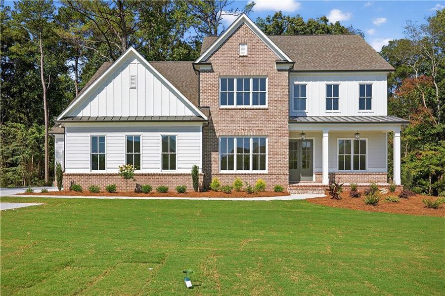 Front exterior of a new home in , Cumming, GA, highlighting curb appeal (Image 27).