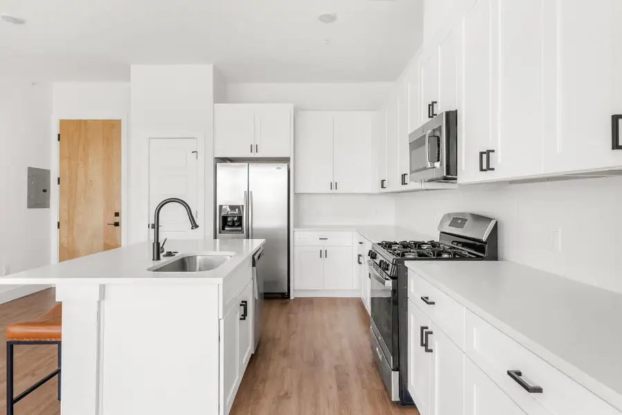 Furnished interior view inside a new home in East Grove Condominiums, Austin (Image 9).