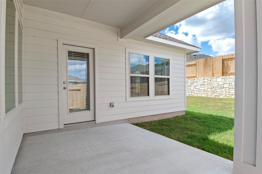 Exterior details and patio area of a home in Crosswinds, Kyle (Image 3).