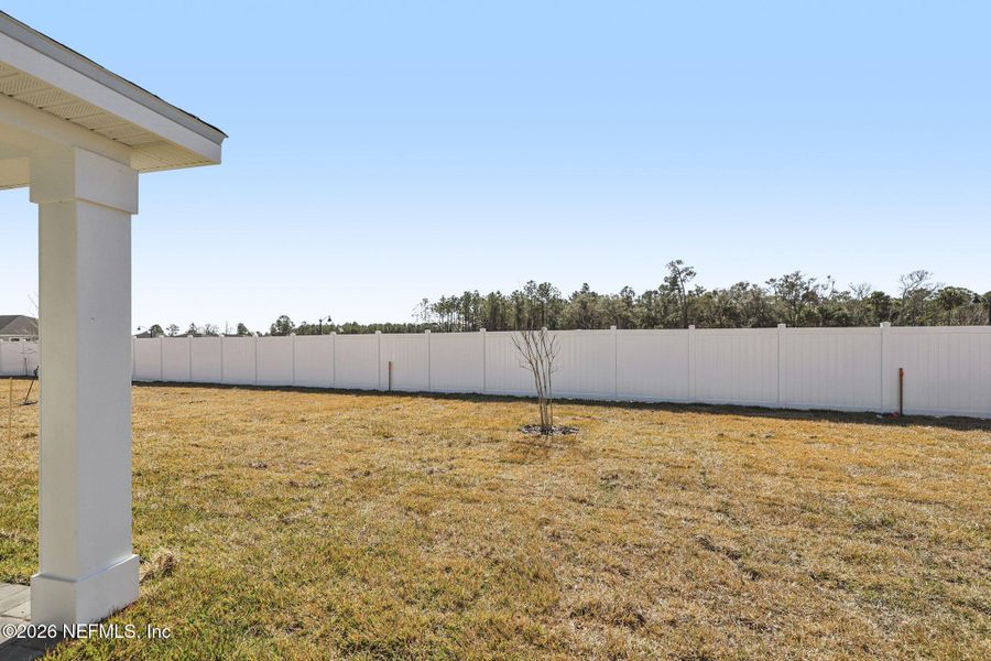 Exterior details and patio area of a home in Colbert Landings, Palm Coast (Image 3).