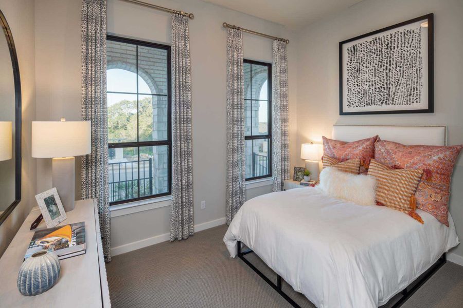 Representative furnished interior of a home built from the Amberley.535 by Highland Homes in Riceland, Mont Belvieu (Image 18).