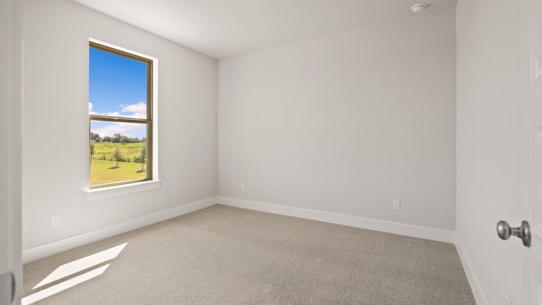 Representative unfurnished interior of a home built from the 2713F by Perry Homes in Star Farms at Lakewood Ranch, Bradenton (Image 21).