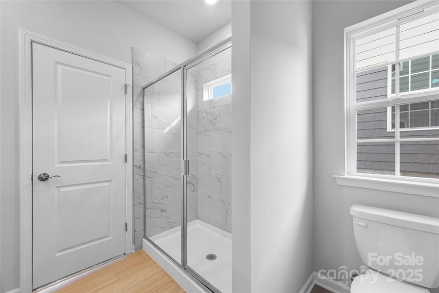 Furnished interior view inside a new home in Redhawk: Walk, Belmont (Image 9).