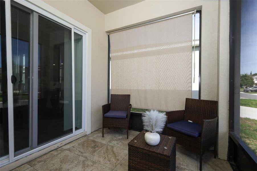 Exterior details and patio area of a home in Windrose, Apopka (Image 4).