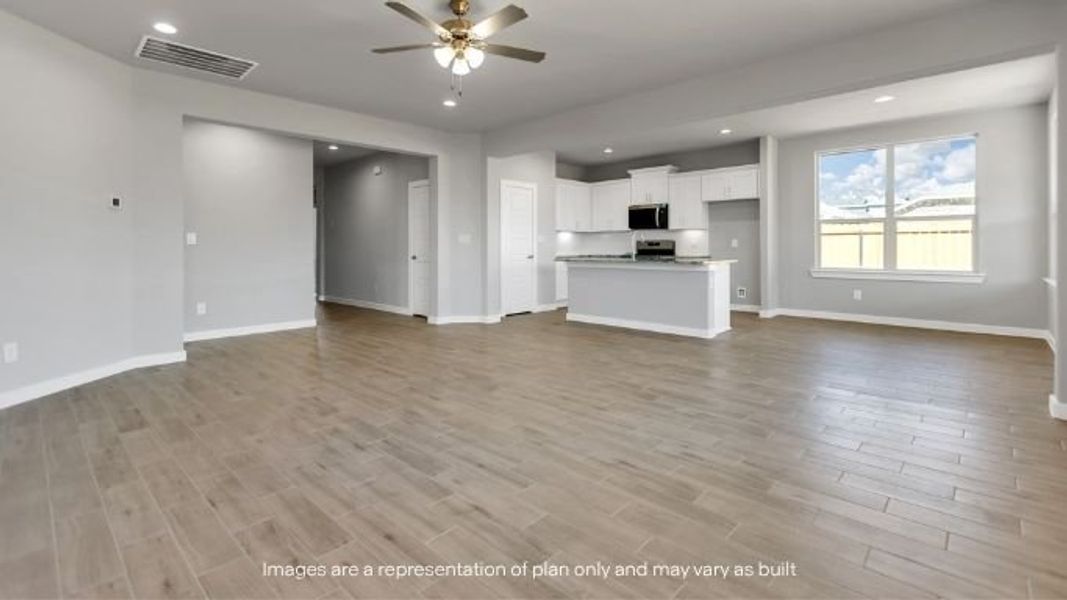 Representative unfurnished interior of a home built from the June by D.R. Horton in Homestead at Parks Bell Ranch, Odessa (Image 12).