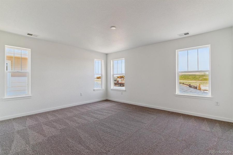 Spacious, unfurnished interior of a new home in Harvest Crossing, Aurora (Image 19).