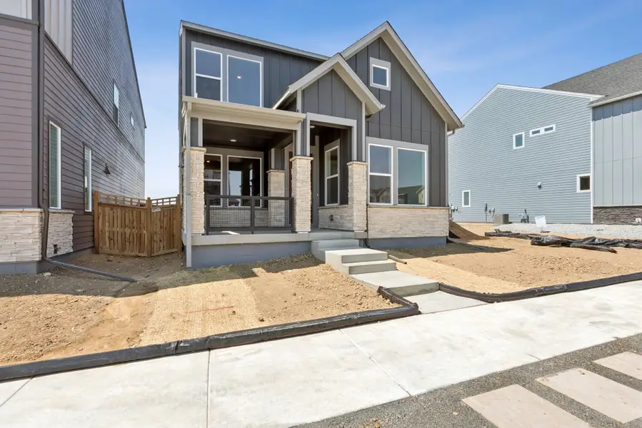 Exterior details and patio area of a home in Baseline Peaks Collection, Broomfield (Image 3).