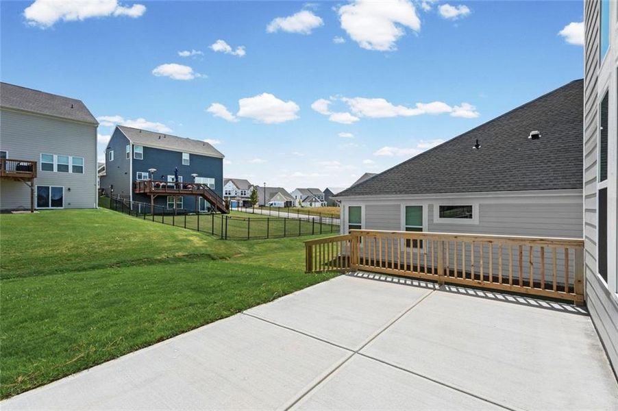 Exterior details and patio area of a home in Twin Lakes, Hoschton (Image 26).