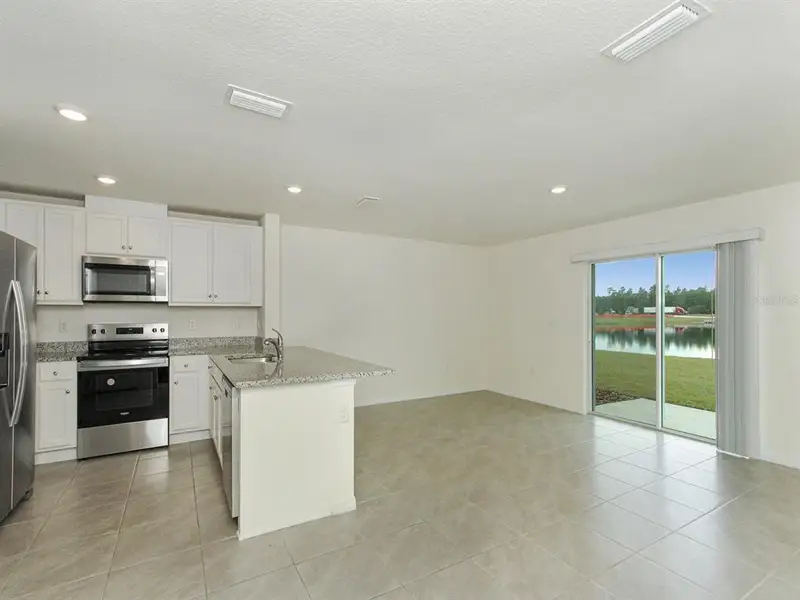 Furnished interior view inside a new home in , Harmony (Image 5).