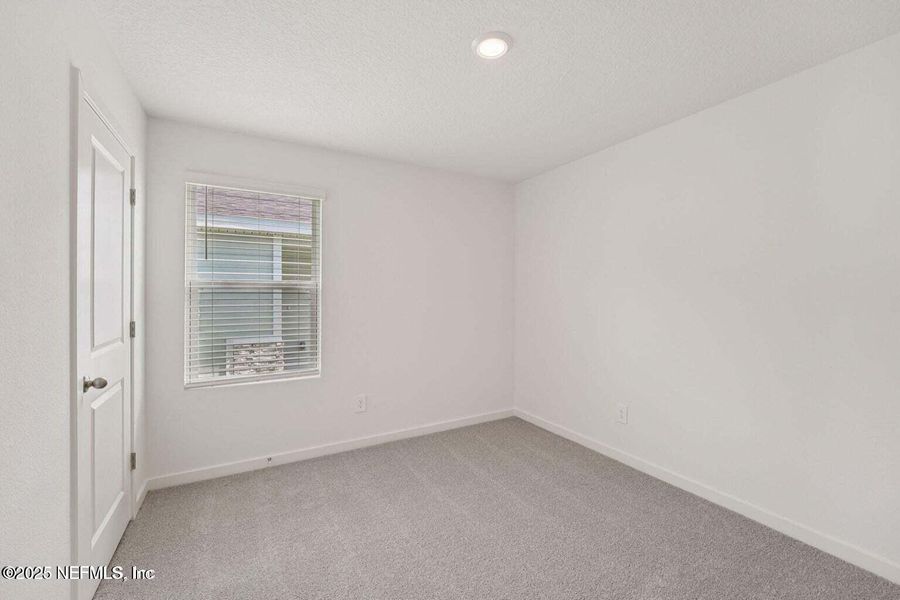 Spacious, unfurnished interior of a new home in Flagler Village - Classic Series, Palm Coast (Image 18). Spacious, unfurnished interior of a new home in Flagler Village - Classic Series, Palm Coast (Image 18).