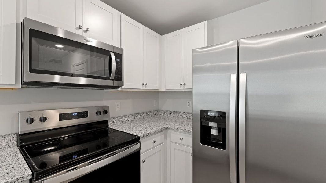 Representative furnished interior of a home built from the HELENA by D.R. Horton in Center Pointe, Santee (Image 6).