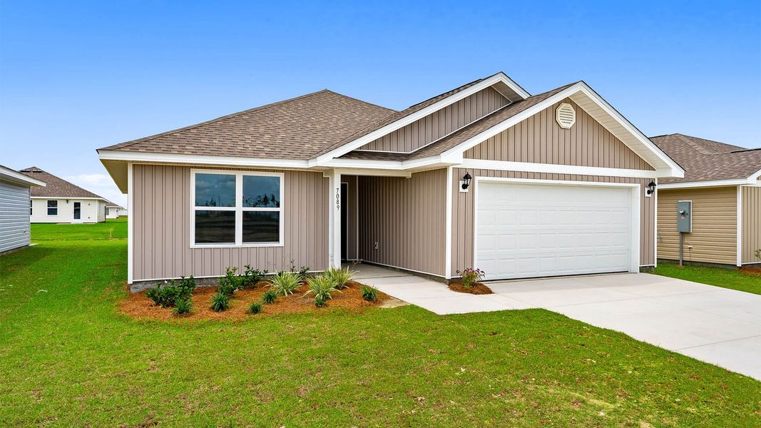 Front exterior of a new home in Liberty, Panama City, FL, highlighting curb appeal (Image 2). Front exterior of a new home in Liberty, Panama City, FL, highlighting curb appeal (Image 2).