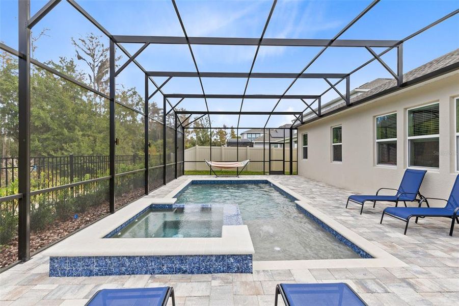 Exterior details and patio area of a home in Eden at Crossprairie, St. Cloud (Image 24).