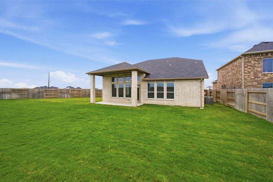 Exterior details and patio area of a home in Creekhaven, Arcola (Image 26).