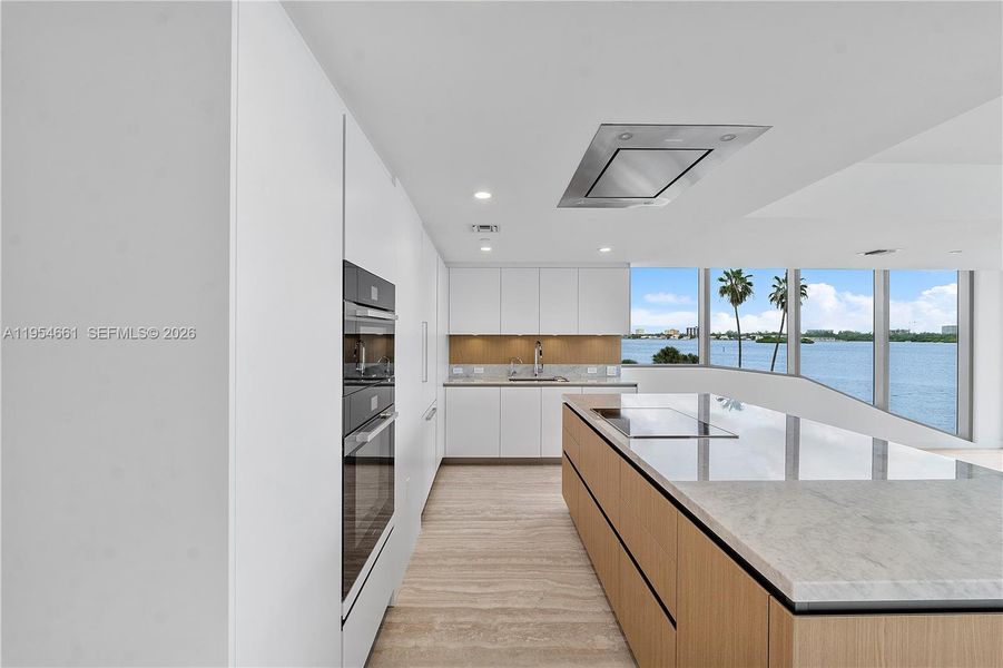 Furnished interior view inside a new home in , Bay Harbor Islands (Image 9). Furnished interior view inside a new home in , Bay Harbor Islands (Image 9).