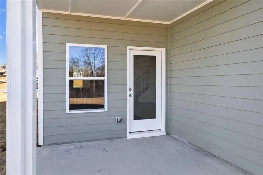 Exterior details and patio area of a home in Roxeywood Park, Winder (Image 4).