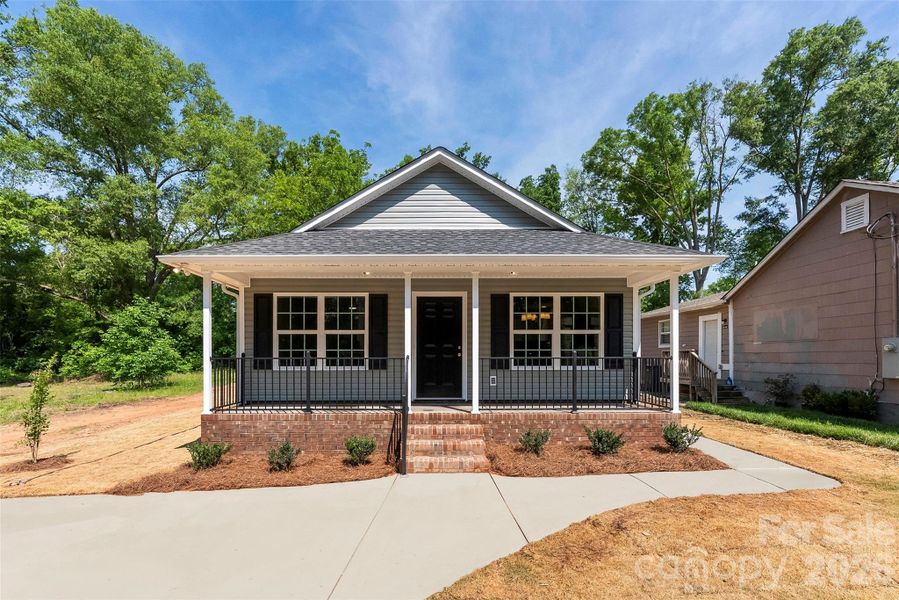 Front exterior of a new home in , Rock Hill, SC, highlighting curb appeal (Image 1). Front exterior of a new home in , Rock Hill, SC, highlighting curb appeal (Image 1).