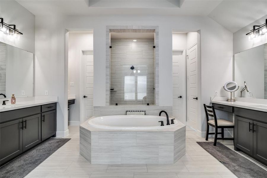 Two separate vanities mean you don't have to share (if you don't want to!) counter space. This bathroom feels very much like a private spa! Two separate vanities mean you don't have to share (if you don't want to!) counter space. This bathroom feels very much like a private spa!