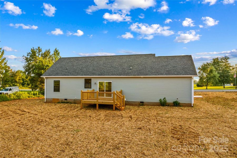 Front exterior of a new home in , Olin, NC, highlighting curb appeal (Image 1). Front exterior of a new home in , Olin, NC, highlighting curb appeal (Image 1).