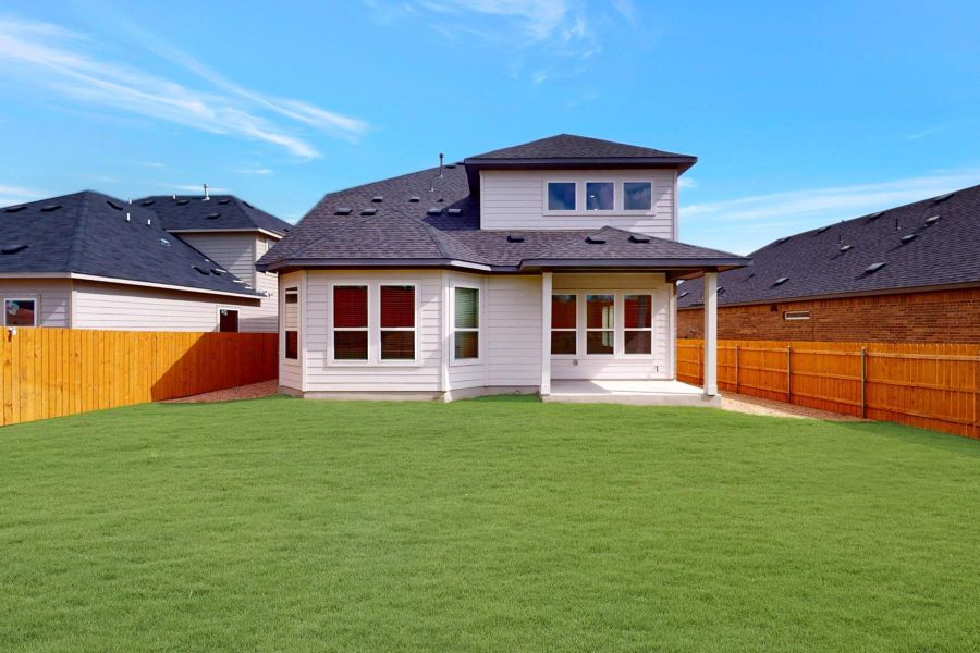 Exterior details and patio area of a home in Cascades at Onion Creek, Austin (Image 4).