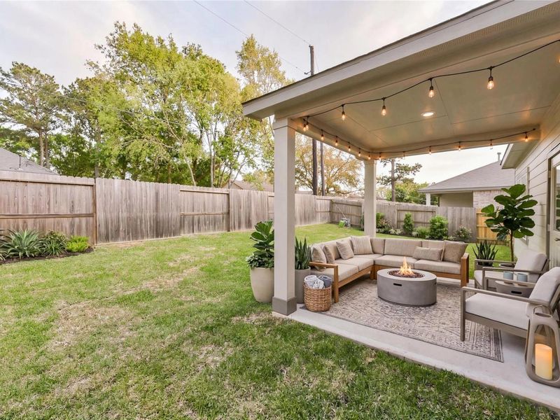 Exterior details and patio area of a home in Windmill Estates, Magnolia (Image 3).