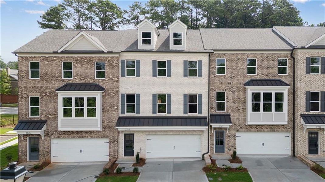 Front exterior of a new home in , Suwanee, GA, highlighting curb appeal (Image 1). Front exterior of a new home in , Suwanee, GA, highlighting curb appeal (Image 1).