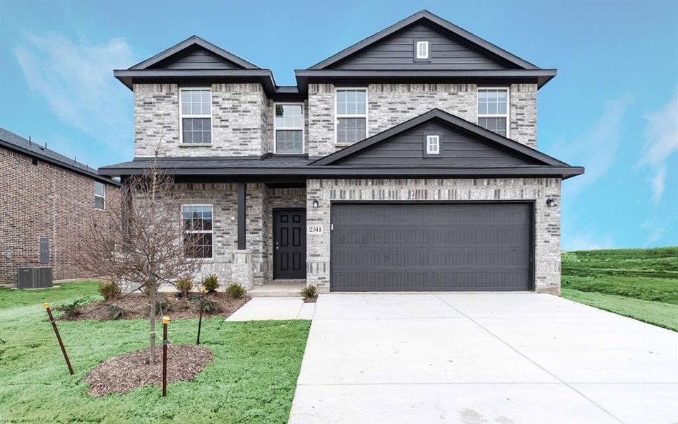 Front exterior of a new home in Pebblebrook, Sherman, TX, highlighting curb appeal (Image 1). Front exterior of a new home in Pebblebrook, Sherman, TX, highlighting curb appeal (Image 1).
