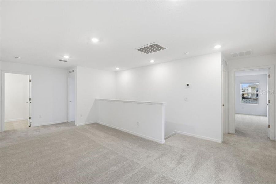 Spacious, unfurnished interior of a new home in Waterstone, Groveland (Image 44).