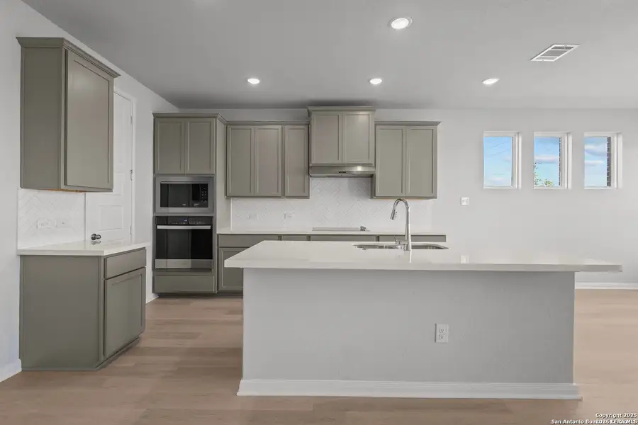 Furnished interior view inside a new home in Megan's Landing, Castroville (Image 7).
