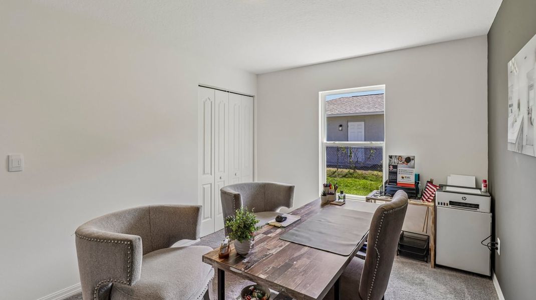 Representative furnished interior of a home built from the Marigold by Maronda Homes in Vero Lake Estates, Vero Beach (Image 7).