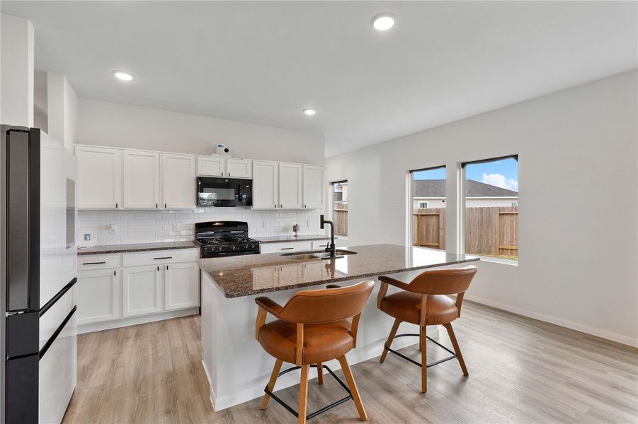 Furnished interior view inside a new home in Sweetgrass Village, Crosby (Image 9).