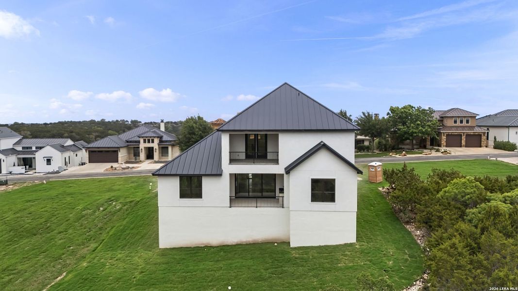 Front exterior of a new home in , Boerne, TX, highlighting curb appeal (Image 35).