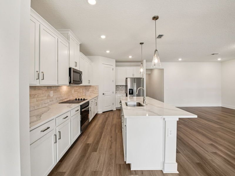 Furnished interior view inside a new home in Legends Preserve - Signature Series, Daytona Beach (Image 4).