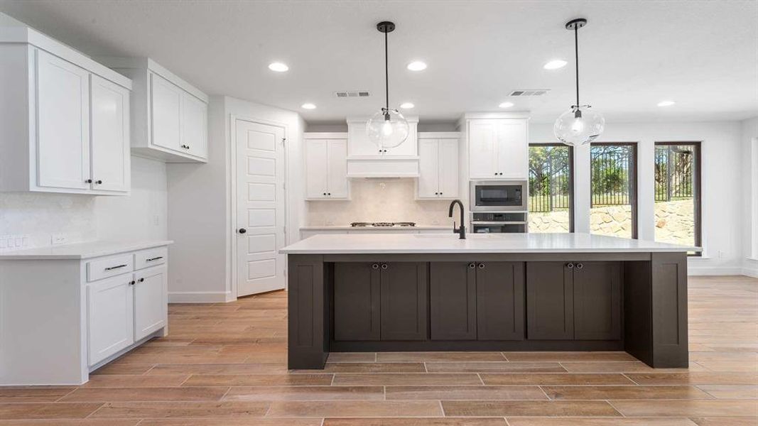 Furnished interior view inside a new home in The Heights At Uptown Celina 50', Celina (Image 12).