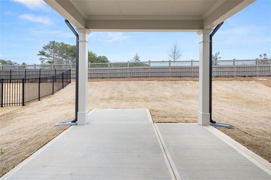 Exterior details and patio area of a home in Soleil Summit Chase, Snellville (Image 32).