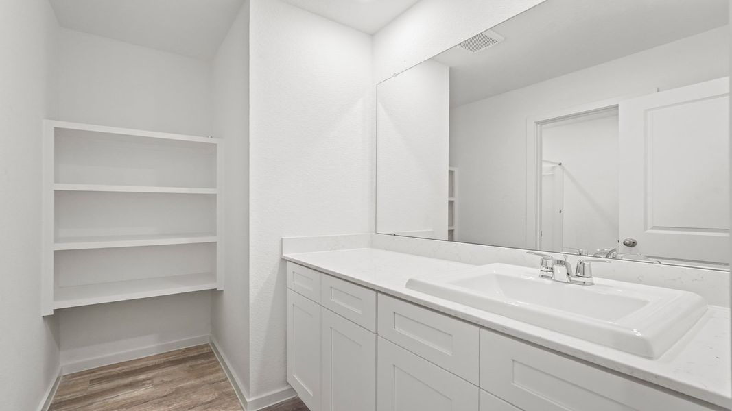 Furnished interior view inside a new home in Sunterra, Katy (Image 10).