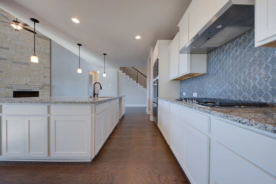 Representative furnished interior of a home built from the Barnett by Ashton Woods in Sunday Creek at Kinder Ranch, San Antonio (Image 7).