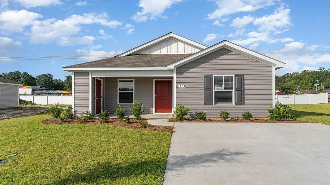 Front exterior of a new home in The Forest at Black Bear, Longs, SC, highlighting curb appeal (Image 2). Front exterior of a new home in The Forest at Black Bear, Longs, SC, highlighting curb appeal (Image 2).